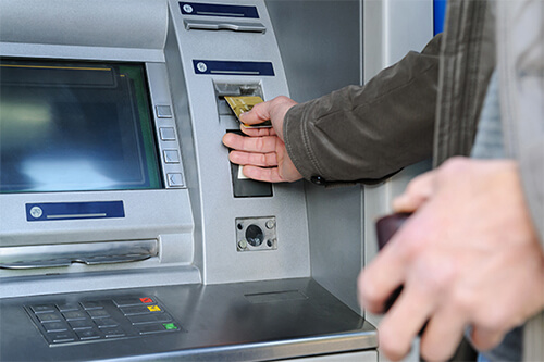 Withdrawing Cash At An Atm