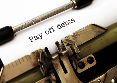 Typewriter pay off debts