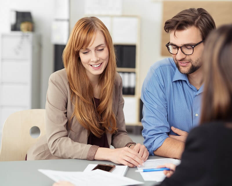 A couple speaks with a credit counsellor