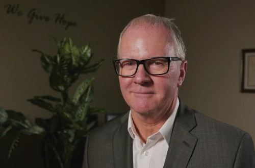 Scott Hannah in his office at the Credit Counselling Society.