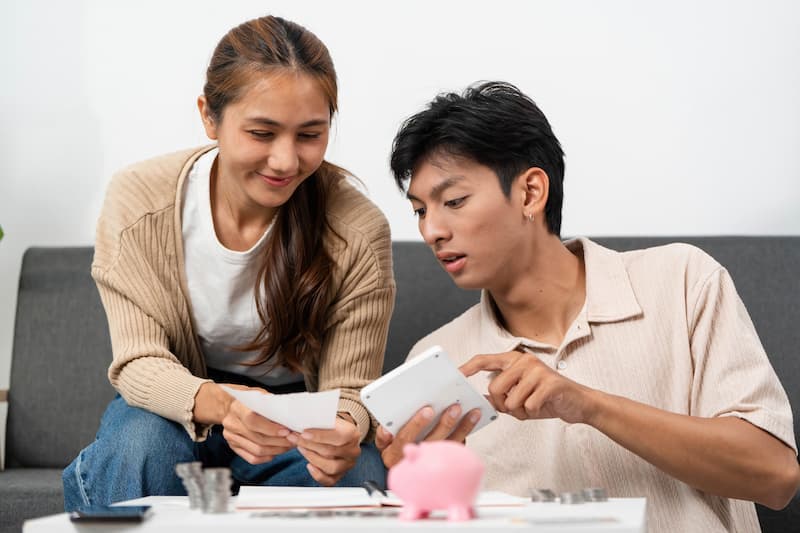 Couple Talking About Credit Card Debt and Budget