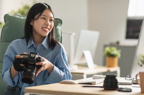 Freelance photographer at her desk